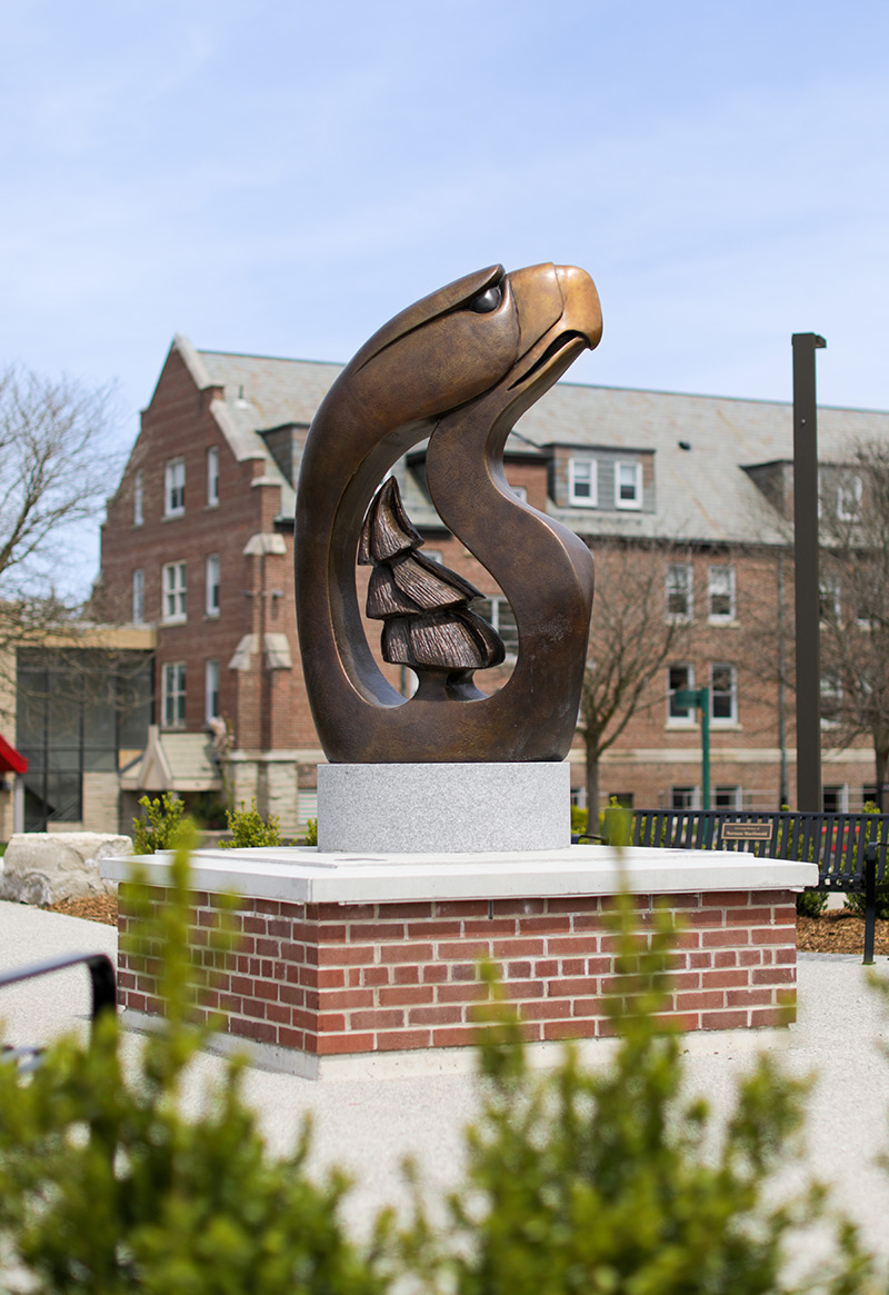 Image of the Eagle Tree of Peace statue on the Huron campus