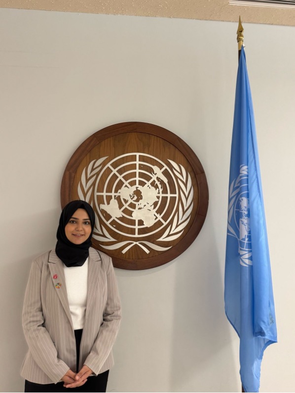 Hiba highlights her university with pride during her speech and sports the prestigious pin students are gifted at Commencement.