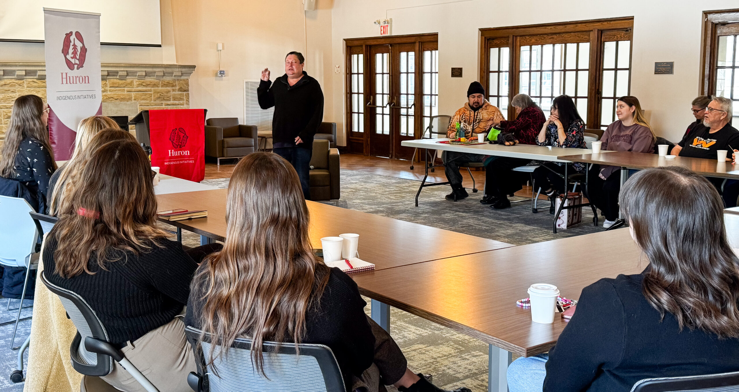 ean Hoogterp, Indigenous Initiatives Coordinator speaks to a group at Huron University